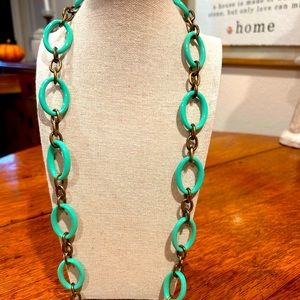 J. Crew’s turquoise link 28 in necklace.